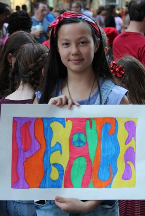 Young people from the Broadway community sing John Lennon's 'Imagine' for peace Photo